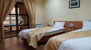 Гостиница Альпика Дубовое Стандартный двухместный номер с 2 отдельными кроватями-1